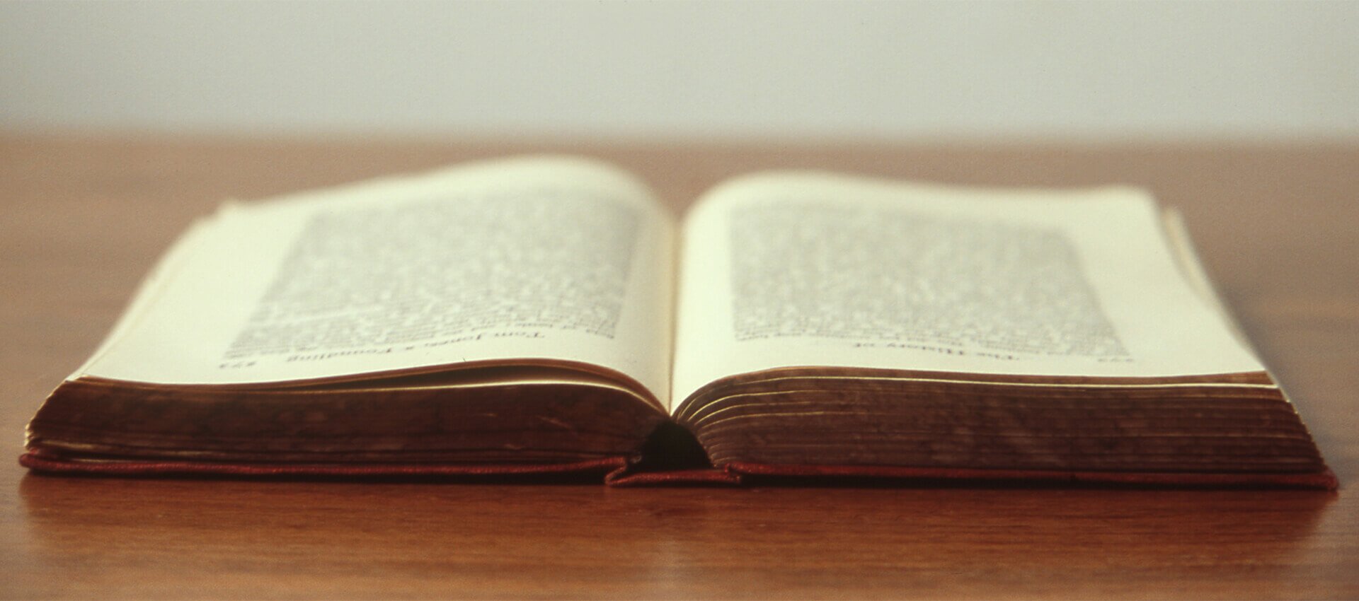 Open book on a table representing everyday learning and inspiration