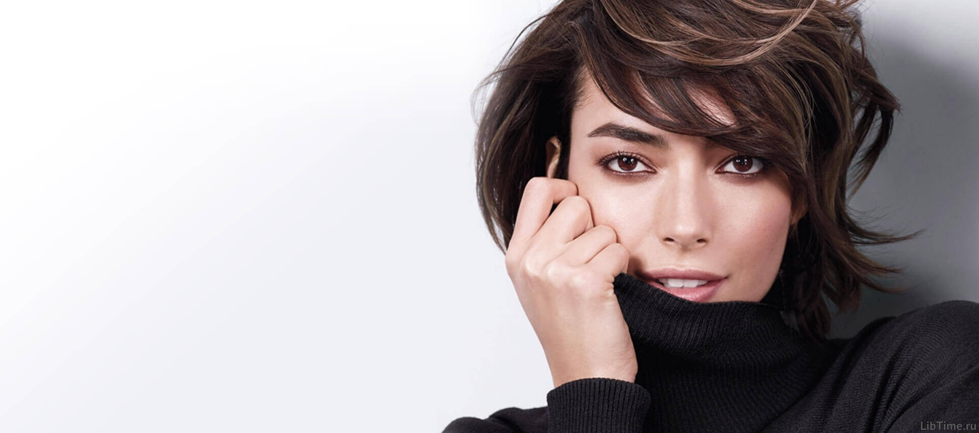 Close-up portrait of a woman’s face highlighting natural beauty